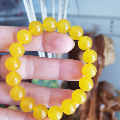 Chiếc Vòng tay đá mã não vàng anh tươi quá đẹp Size hạt 10mm Nữ mệnh kim thổ thủy đeo Vòng vàng anh này người lớn trẻ em nhỏ đeo được hết ạ rất là xinh xắn luôn