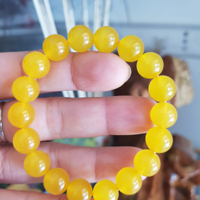 Chiếc Vòng tay đá mã não vàng anh tươi quá đẹp Size hạt 10mm Nữ mệnh kim thổ thủy đeo Vòng vàng anh này người lớn trẻ em nhỏ đeo được hết ạ rất là xinh xắn luôn