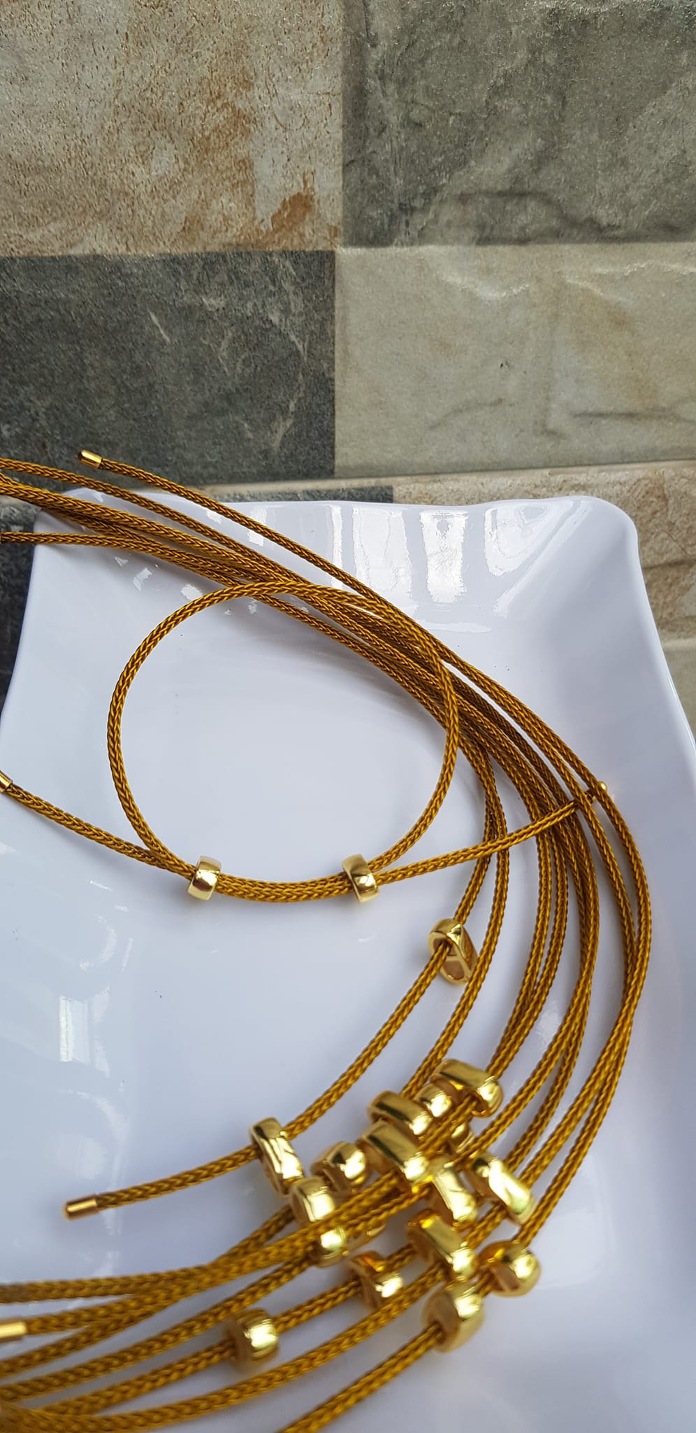 Dây thun VÀNG dẻo 2mm phối vòng tay Charm hạt đá hạt lu thống Size dây đỏ 2mm Nữ đã có hạt lu thống thì đây chính là sợi dây thun VÀNG phối với hạt lu thống đeo xinh ạ