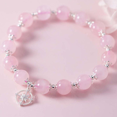 Vòng tay đá thạch anh hồng phối charm bánh xe mệnh hỏa, thổ - Ngọc Quý Gemstones